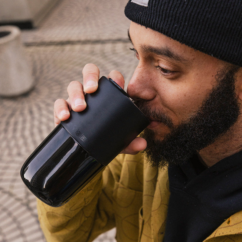 daily-on-the-go-set-b6 16oz_rise_tumbler_black_man_drink_square.jpg