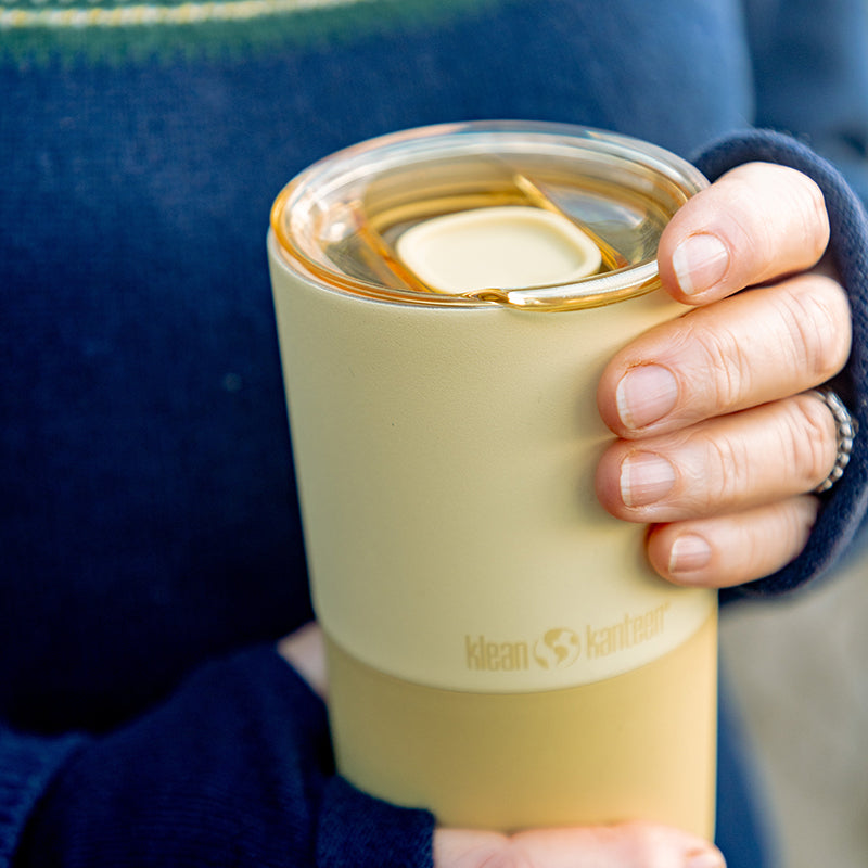 daily-on-the-go-set-b6 16oz_rise_tumbler_wax_yellow_closeup_hand_lid_square.jpg