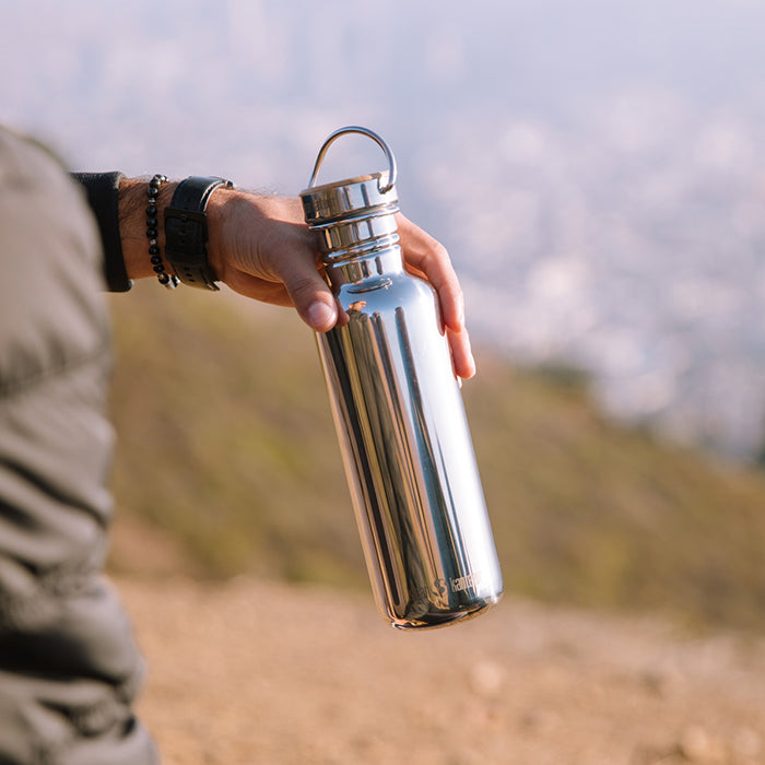 27oz-reflect-with-bamboo-cap-k8 K27SSLRF-MS-BAMBOO_reflect_bottle_hand_lifestyle.jpg