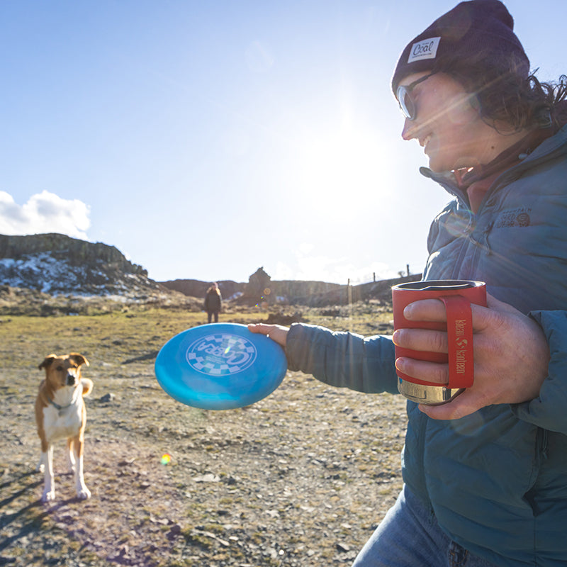 12oz-camp-mug-a3 insulated_camp_mug_12oz_woman_dog_frisbee_square.jpg