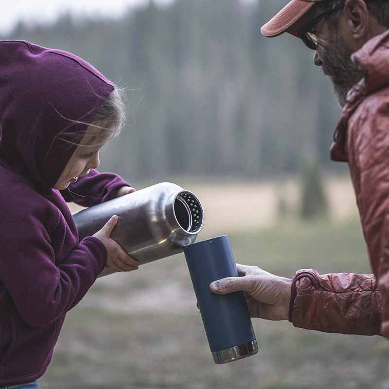 64oz-tkwide-with-loop-cap-q7 tkwide_64oz_bottle_girl_dad_filling_square.jpg